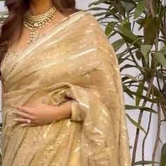 labelsnigdhakapoor on January 3, 2024: "Presenting “Sunehri “ Saree is delicately embroidered with shiny sequins in a linear pattern,..." Saree Golden, Golden Saree, Bridal Sari, Embroidery Wedding, Saree Fashion, Linear Pattern, January 3