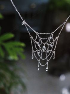 Spiderweb Crystal Silver Necklace | Jewelry | Three Fleas Gothic Sterling Silver Chain Jewelry, Silver Drop Chain Jewelry, Bohemian Silver Drop Jewelry, Gothic Silver Teardrop Jewelry, Gothic Teardrop Silver Jewelry, Bohemian Silver Crystal Clavicle Chain Necklace, Bohemian Silver Crystal Necklace With Clavicle Chain, Ethereal Sterling Silver Jewelry Gift, Ethereal Sterling Silver Jewelry As Gift