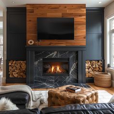 a living room filled with furniture and a flat screen tv mounted above a fire place