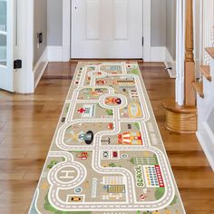 a child's play area rug with cars and trucks on it in front of a door