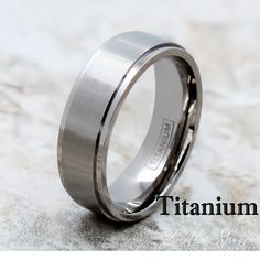 an image of a wedding ring with the words titanium on it