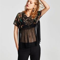 - Sheer Black Blouse By Zara - Loose Fit - Embroidered Flower And Feather Detailing On Sleeves - Lace Design On Top - Polka Dot Design On Bottom - Button Back Closure - Brand New With Tags Ships In 1-2 Business Days Measurements Approximate Open To Reasonable Offers. 15% Off Bundles Of 2+ Items. Save On Shipping! Black Lace Top With Short Sleeves, Black Lace Short Sleeve Tops, Black Lace Top With Lace Work, Black Lace Patchwork Tops For Summer, Black Short Sleeve Tops With Lace Patchwork, Festival Lace Tops With Short Sleeves, Black V-neck Tops With Floral Embroidery, Black V-neck Blouse With Floral Embroidery, Embroidered Short Sleeve Lace Blouse