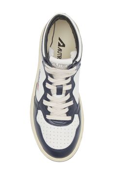 Vintage-inspired design elevates a sporty sneaker with smart perforations for breathable comfort. Lace-up style Leather upper/textile and leather lining/rubber sole Imported Functional High-top Sneakers With Perforations, Blue Lace-up High-top Sneakers With Perforations, White High-top Sneakers With Perforations For Running, High-top Sneakers With Laces For Running, Running High-top Sneakers With White Sole And Laces, Sporty High-top Sneakers For Running, Blue Casual High-top Sneakers With Perforations, Casual Blue High-top Sneakers With Perforations, Blue Low-top Basketball Shoes With Perforations