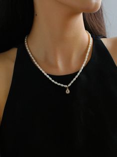 This exquisite piece features lustrous, iridescent natural freshwater pearls paired with a micro-pavé zircon pendant. The pendant comes in classic and sophisticated shapes—square, teardrop, and oval—adding a touch of refined luxury. Whether worn alone or layered, this necklace enhances any outfit with its graceful charm and subtle opulence. Metal: 18K Recycled Gold Plated Brass Gemstone: Freshwater Pearl Chain Length: 410-460mm Pendant Dimensions: 6-8mm Necklaces Pearl, Edison Pearls, Tiger Eye Stone, Pearl Chain, Recycled Gold, Ring Bracelet, Stone Necklace, Chain Lengths, Chain Length