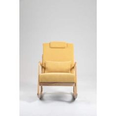 a yellow reclining chair sitting on top of a white floor