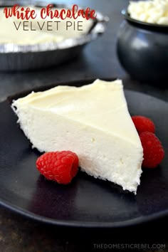 a piece of white chocolate velvet pie with raspberries on a plate next to it