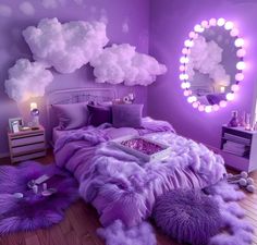 a purple bedroom with clouds painted on the wall and lights in the mirror above it