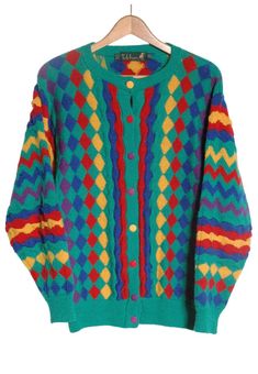 Vintage Tulchan cardigan straight from the 1980's. Made in a wool fabric. Vibrant multi coloured design. Lovely detail with the different colour front buttons. Label reads One Size. For s oversized look could be worn by smaller sizes. Condition: Excellent vintage condition. Bust: 40in Length: 26in Inside sleeve: 19in More vintage clothing on our website www.brickvintage.com Brown Leather Messenger Bag, Vintage Cardigan, Little Outfits, Wool Cardigan, Wool Fabric, Pretty And Cute, Tweed Jacket, Cardigans For Women, Sweaters & Cardigans