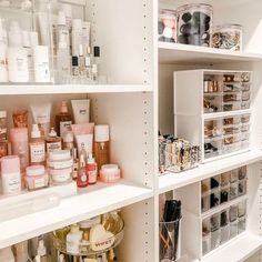 the shelves are filled with many different types of cosmetics and personal care products in containers