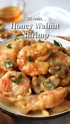 a plate full of shrimp and nuts with the words 30 minute honey walnut shrimp on it