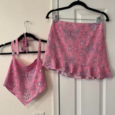 - Pink Bandana Halter Top & Skirt Set - Size: S (Both Top And Skirt) - Like New Without Tags - Tags: Western, Mini, Sugar Star, Cowboy, Cowboys, Cowgirls, Southwest, Nashville, Texas Girl, Wild West, Date Night, Party, Birthday, Spring, Summer, Night Out, Y2k, Goth Pop, 2000’s Style, Fun Fashion, Bandanna Print, Color Pop, Dreamy, Bubblegum, Pink, Purple, Graphic V Top, Light Weight, Mid-High Waist Fit, Floral, Flowers, Womens, Juniors, Misses Teen, Barbie Movie, Outfit, Cowgirl Casanova, Gypsy, Pink Mini Skirt For Spring Festival, Purple Mini Skirt For Summer Beach, Fitted Purple Skirt For Vacation, Bandana Halter Top, Outfit Cowgirl, Movie Outfit, Halter Top And Skirt, Pink Bandana, V Top