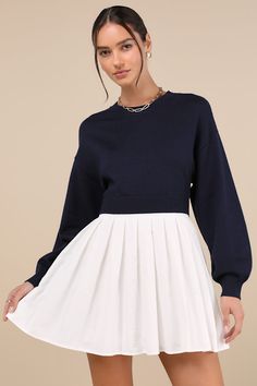 We can't over the adorable energy we're feeling from the Lulus Contemporary Comfort Navy Layered Pleated Sweater Mini Dress! Soft and stretchy sweater knit shapes this cute dress that has a sweater-inspired bodice, long balloon sleeves (with drop shoulders and fitted cuffs), and a crew neckline, as well as ribbed knit trim throughout. Pleated, white woven skirt lends a cute layered effect, with a flirty mini hem to complete the look. Fit: This garment fits true to size. Length: Mid-thigh. Size m Casual Mini-length Pleated Skort, Knee-length Relaxed Mini Skirt With Pleated Waist, Navy Pleated Mini Skirt, Non-stretch Solid Pleated Mini Skirt, Elegant Non-stretch Mini Sweater Dress, Sweater Mini Dress, Long Balloons, Mini Sweater Dress, Cute Dress