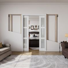 a living room filled with furniture and a white rug