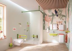 the bathroom is decorated in pastel colors and features an animal - themed wallpaper