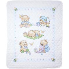 a baby quilt with teddy bears on it