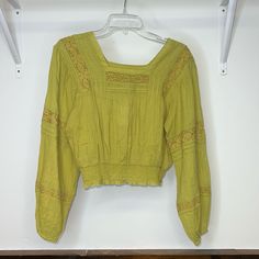 Green American Eagle New With Tags Puff Sleeve Top With Lace Detail In A Size Xs. Comes From A Smoke Free Environment. Bundle Your Likes For A Discount And Discounted Shipping! Posh Ambassador, Fast Shipping! Casual Yellow Long Sleeve Peasant Top, Casual Peasant Top For Summer, Spring Fitted Cropped Peasant Top, Fitted Cropped Peasant Top For Spring, Casual Green Peasant Top For Fall, Casual Yellow Peasant Top For Spring, Fitted Cotton Peasant Top For Spring, Solid Spring Crop Top With Relaxed Fit, Green Cotton Peasant Top For Fall