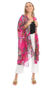 Love to layer in this eclectic long ruana styled in an ultra-comfortable, drapey silhouette and colorful floral pattern that is signature to Saachi's artisanal inspired brand. 34" x 44" Open front Short sleeves 100% rayon Hand wash cold, line dry Imported Model stats: 5'10", 32" bust, 25" waist, 36" hip. Model is wearing size OS. Multicolor Floral Print Outerwear For Festival, Bohemian One Size Floral Print Scarves, Bohemian One-size Floral Print Scarves, Bohemian Floral Print Scarves For Festivals, Multicolor Wrap Spring Outerwear, Multicolor Wrap Outerwear For Spring, One Size Bohemian Scarf With Floral Print, One Size Bohemian Scarves With Floral Print, Spring Multicolor Wrap Outerwear