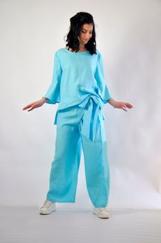 "Wide Leg Pants Set, Linen Pants Set, Loose Outfit Mint linen outfit. 100% LINEN tunic, blouse and pants. Plus size SET. The pants has two big pockets! Extravagant loose aqua top or tunic , so elegant and comfortable. Perfect solution for your everyday outfit. Extremely beautiful and extravagant clothing. Extravagant set. Quality LINEN fabric. It is an artistic and easy to mix. The cut is very convenient. I DO NOT CHARGE EXTRA MONEY for custom made items. Different sizes available XS,S,M,L,XL,XX Summer Linen Wide-leg Pantsuit, Summer Wide Leg Linen Pantsuit, Blue Linen Long Sleeve Sets, Wide Leg Linen Pantsuit For Summer, Summer Linen Wide Leg Sets, Spring Linen Wide Leg Pantsuit, Spring Linen Long Sleeve Pant Set, Spring Wide Leg Linen Pantsuit, Spring Linen Matching Set