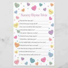 a printable baby shower game with hearts and question marks on the front, which reads nursery rhyme trivia