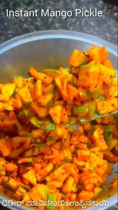 some food is in a bowl on a table with the words instant mango pickle