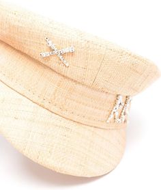 Elevate your look with a touch of casual sophistication in this stylish straw cap. The sand beige color and basket weave design make it a versatile and trendy accessory, while the crystal-embellished logo adds a bit of sparkle for a fun and playful touch. With its curved peak and flat crown, this pull-on style cap is not only fashionable but also comfortable for all-day wear. Sand beige color Basket weave design Crystal-embellished logo Curved peak and flat crown Cotton lining for added comfort Luxury Cream Brimmed Mini Hat, Luxury Beige Mini Hats For Party, Luxury Cream Party Hat, Crown Crystal, Baker Boy Cap, Straw Basket, Baker Boy, Prada Designer, Sand Beige