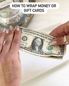 two hands exchanging money to each other with the words how to wrap money or gift cards