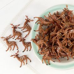 there is a plate full of chocolate reindeer candies