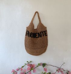 I present a large summer bag made of paper raffia. Hand crocheted raffia in a medium dark straw color. Shoulder shopper made of mesh with a triangle in the middle. You can personalize your bag with a monogram, or any word you want. Just write to me and I will make knitted letters. Size 40*42 cm (15.3*16inches) handle - 25 cm (11.3 inches) Eco-friendly Crochet Bag For Beach Shopping, Summer Market Straw Bag With Open Weave, Crochet Straw Bag For Beach Shopping, Crochet Straw Bag For Shopping In Beach Season, Crochet Straw Bag For Beach Season Shopping, Straw Crochet Bag For Shopping During Beach Season, Summer Crochet Bag For Shopping, Crochet Straw Bag For Shopping During Beach Season, Everyday Summer Crochet Jute Bag