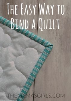 a close up of a quilt with the words, the easy way to bind a quilt