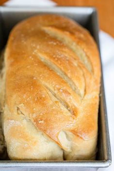 a loaf of bread in a metal pan