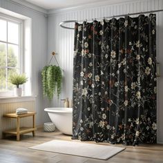 a bath room with a tub and a shower curtain