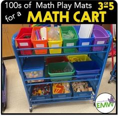 a blue cart filled with lots of different colored bins next to a black and white sign that reads, 100s of math play mats for a math cart