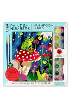 the paint by numbers mushroom forest set is shown in its box with markers and pencils