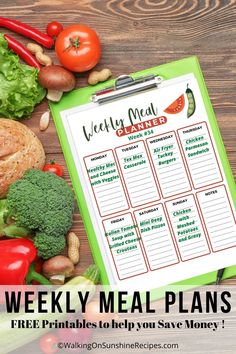 a clipboard with the words weekly meal plans on it next to vegetables and fruits