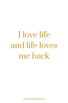 the words i love life and life loves me back are shown in gold on a white background