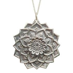 "Sterling silver lotus mandala pendant.  The lotus is born in muck and mire. From sludgy, slimy waters, this brilliant blossom emerges. Many take these humble beginnings as a profound metaphor for life. We can choose to crawl, never lifting our heads up to the light. Or, we can be like the lotus. We can make the best of a lousy situation, rise above, grow, and expand. In this many petaled flower charm, the lotus becomes a mandala - a visually appealing, symmetrical, geometric form that helps qui Silver Oxidized Flower Pendant Jewelry, Silver Jewelry With Oxidized Finish And Flower Pendant, Spiritual Oxidized Flower Pendant Jewelry, Sterling Silver Engraved Necklaces For Meditation, Symbolic Sterling Silver Necklace With Flower Pendant, Silver Engraved Necklace For Meditation, Sterling Silver Symbolic Necklace With Flower Pendant, Silver Bohemian Flower Pendant Jewelry, Antique Silver Flower Pendant Necklace In Sterling Silver