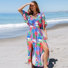 Embrace weekend vibes in the Bright Tropical Smocked Maxi Dress. Perfect for brunch with friends or a family gathering, its easy-going style and bright print make every day feel like a getaway. Whether you're attending a garden party or enjoying a beachside dinner, this versatile dress is your go-to choice for any warm-weather occasion. Product code: CAA05A4D165EE Casual Multicolor Print Vacation Dress, Casual Multicolor Print Dress For Vacation, Multicolor Print Vacation Dresses, Colorful Patterned Dress For Beach Vacation, Colorful Pattern Dresses For Beach Vacation, Multicolor Print Dresses For Vacation, Colorful Summer Dresses For Vacation, Casual Multicolor Print Dress For Beach Party, Casual Colorful Dresses For A Beach Party