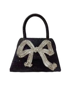 This Koko Bow Embellished Mini Tote Bag In Black is the perfect accessory for any fashionista. Its bow embellishments and petite size make it a fashionable and functional accessory. Featuring a roomy main compartment and extra pockets, it offers ample storage space while maintaining its stylish appeal.Material: PU Elegant Bags With Decorative Bow, Elegant Black Bag With Bow, Party Mobile Phone Bag With Double Handle, Evening Bags With Bow Detail, Black Formal Bag With Bow, Formal Black Bag With Bow, Black Party Bags With Bow Detail, Black Rectangular Bag With Bow, Evening Top Handle Bag With Detachable Bow