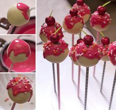 there are many pink and white desserts on sticks