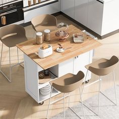 a kitchen island with stools in front of it and some food on the counter