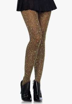 You might need sunglasses for this one — the Marsha Shimmer Tights by Leg Avenue pack an extra sparkly punch. These glittery tights are ultra comfortable and will wrap you in starlight. * Package includes: Tights * High quality hosiery fabric for long lasting wear * Shimmer material gleams with every movement * Stretchy and comfortable fit * Breathable micro net Glamorous Stretch Tights For Night Out, Glamorous Stretch Tights For Party, Glamorous Stretch Thigh High Tights, Glamorous Stretch Thigh-high Tights, Glamorous Thigh High Tights, Stretch Hosiery For Winter Parties, Stretch Winter Hosiery For Party, Trendy Stretch Hosiery For Party, Thigh High Hosiery For Winter Parties