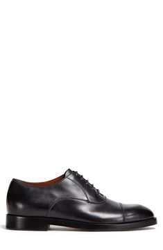 Crafted with flexible, lightweight Blake construction, this Italian-made oxford with a richly polished finish pairs classic elegance with contemporary flair. Lace-up style Leather upper and lining/leather and synthetic sole Made in Italy Men's Designer Shoes Elegant Wingtip Oxford Shoes For Work, Elegant Wingtip Oxford For Workwear, Elegant Brogue Oxford Shoes For Work, Elegant Oxford Shoes With Brogue Detailing For Work, Elegant Cap Toe Derby Shoes For Work, Elegant Cap Toe Oxford For Workwear, Elegant Business Oxford Shoes With Cap Toe, Elegant Cap Toe Oxford For Business, Classic Plain Toe Oxford For Work