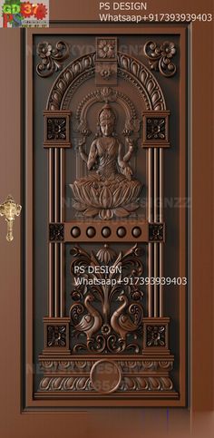 an ornate door with a buddha statue on it