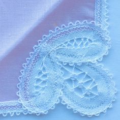 "You will buy two boxed new vintage bobbin lace handkerchiefs handmade in Bruges, Belgium. These two crisp pink and lemon cotton hankies have white lace designs in one corner both of which are absolutely beautiful (see photographs). The handkerchiefs have additional white lace trim on all four sides. The handkerchiefs measure 21.5 cms square. The handkerchief can be washed by hand or machine. These handkerchiefs are in mint condition and come in their original packaging. There are a few scuff ma Classic Handkerchiefs With Lace Trim As Gift, Elegant Lace Work Handkerchiefs Gift, Vintage Lace Trim Handkerchiefs As Gift, Vintage Handkerchiefs With Lace Trim For Gift, White Handmade Handkerchief As Gift, Handmade White Handkerchiefs For Gift, Vintage Cream Handkerchiefs As Gift, Vintage Cream Handkerchiefs Gift, Vintage Cream Handkerchief As Gift