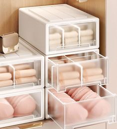 the drawers are organized with clear plastic bins