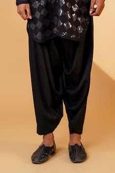 Black kurta with sequin motif embroidery and lace details. Paired with a pathani pant. - Aza Fashions Black Kurta, Motif Embroidery, Men Kurta, Band Collar, Pant Set, Aza Fashion, Lace Detail, Pants Set, Sequin