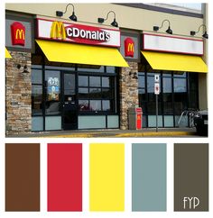 a mcdonald's restaurant with yellow and red awnings