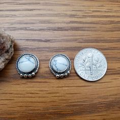 Visit shop: Etsy.com/shop/925ForHer *sterling silver Earrings *white buffalo turquoise these earrings are made to ship, slight variations in stones will occur due to nature of stone *small silver concho *cabochon: 8mm *one cent penny is 19mm for comparing size. *nickle free *handcrafted in Albuquerque, New Mexico, USA *free convenient gift box *free cute litle gift box Shop: Etsy.com/shop/925ForHer White Southwestern Sterling Silver Jewelry, Nickel-free White Southwestern Earrings, Southwestern Style White Round Jewelry, Southwestern Style White Nickel-free Jewelry, Bohemian White Sterling Silver Earrings, White Buffalo Turquoise, Southwestern Jewelry, Sterling Silver Stud Earrings, Small Earrings Studs