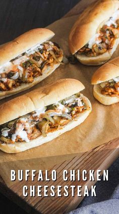 four buffalo chicken cheesesteak sandwiches on a cutting board with the title above it