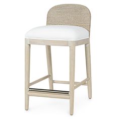 an upholstered stool with a white cushion on the seat and backrests